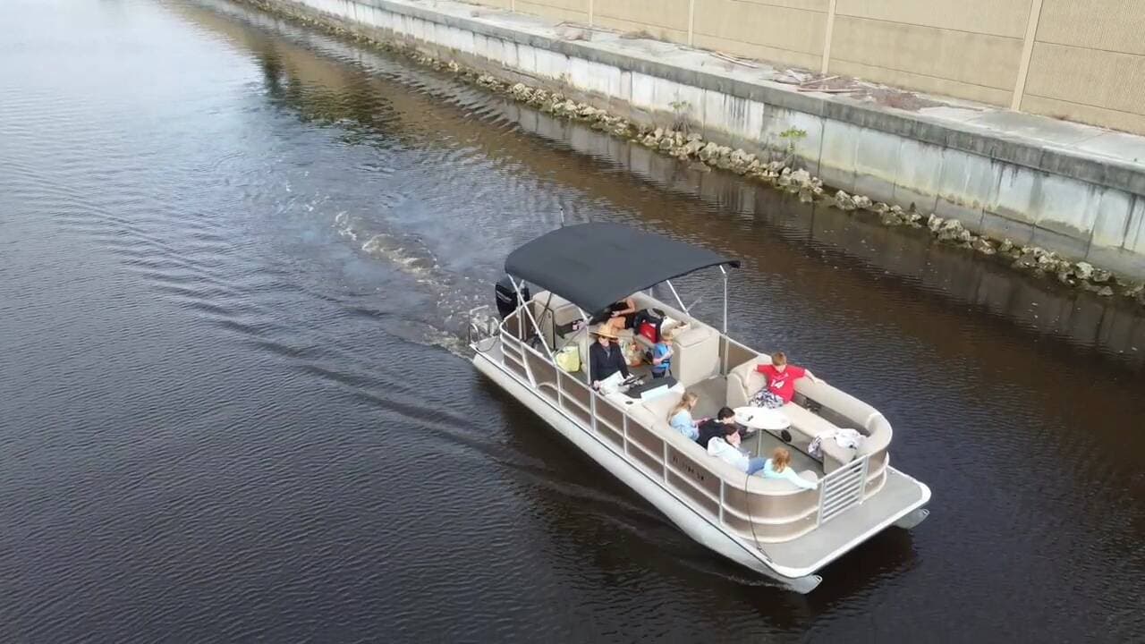 Family enjoying a group boat day
