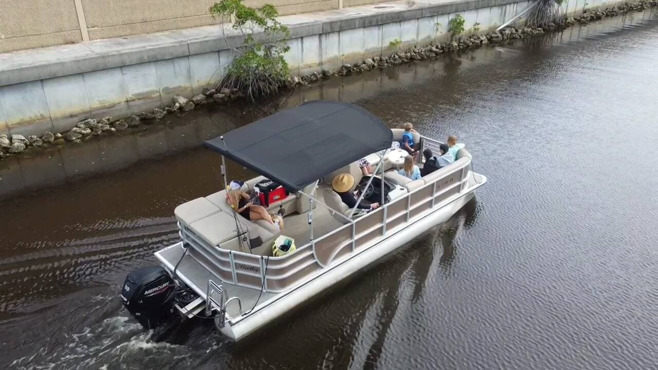 Pontoon cruising through Southwest Florida water
